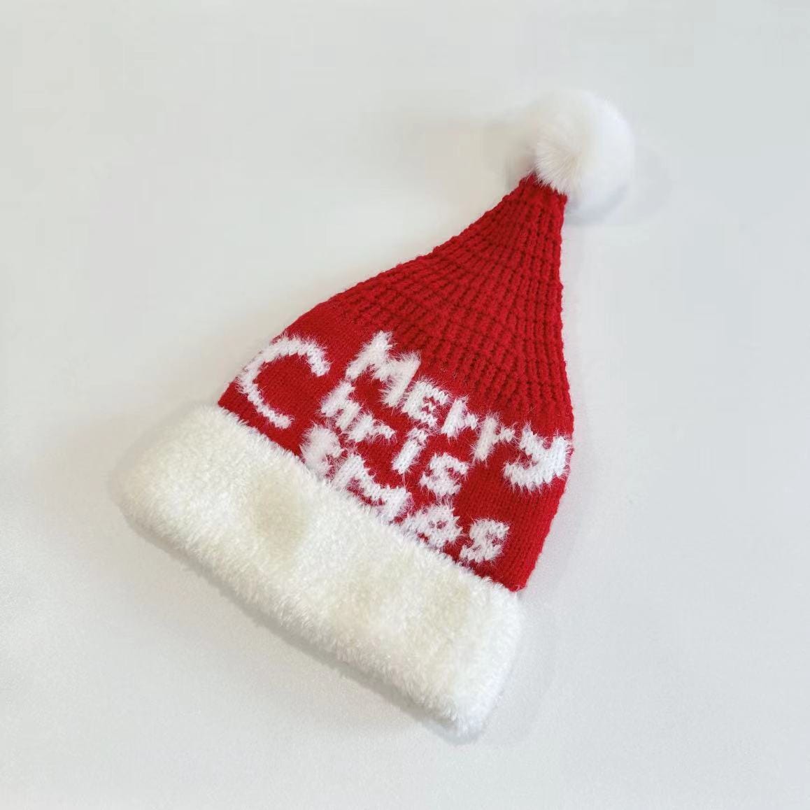 Bonnet Père Noël rouge en maille avec inscription Merry Christmas jacquard