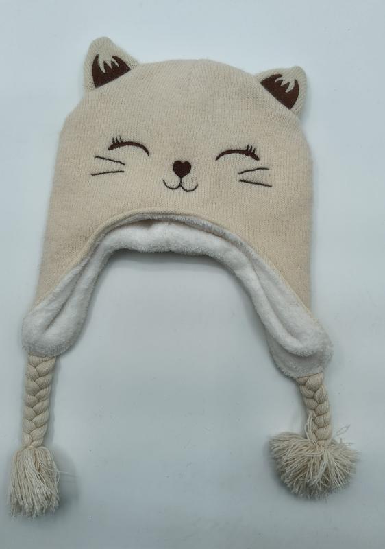 Chapka tricotée crème en forme de chat avec cache-oreilles