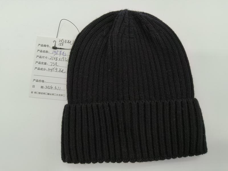Bonnet noir en maille côtelée laine pure avec revers replié profond