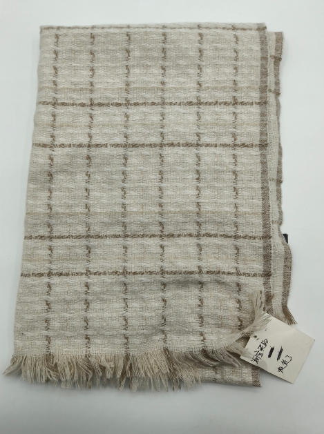 Plaid tissé à carreaux ivoire et beige avec franges
