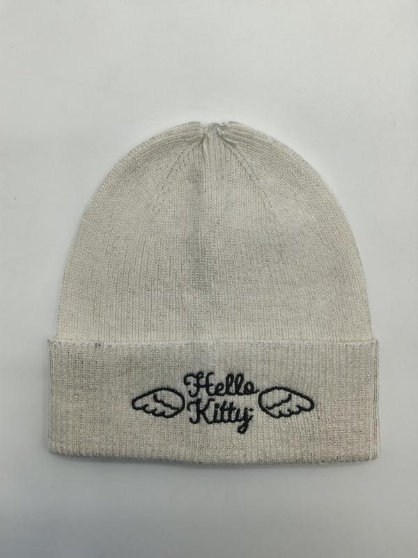 Bonnet côtelé crème avec broderie ailes d'ange et motif graphique sur le revers replié