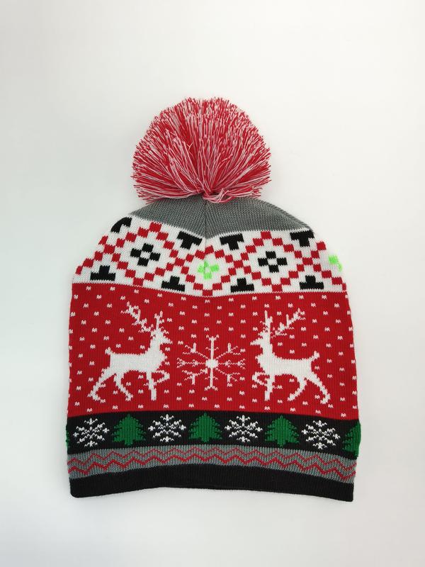 Bonnet de Noël rouge tricoté avec rennes blancs