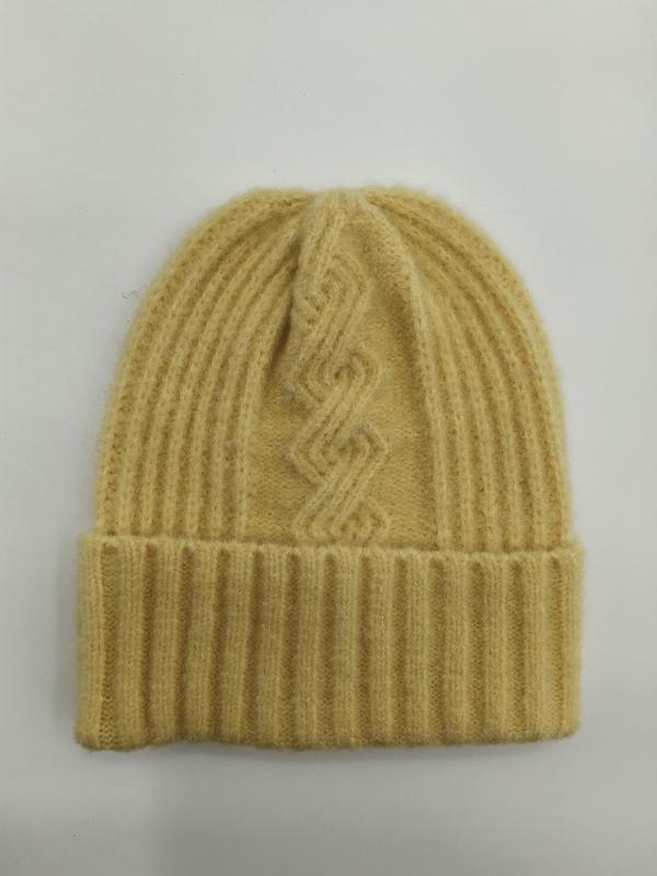 Bonnet beanie jaune beurre en laine tricot côtelé avec motif torsadé géométrique et revers replié