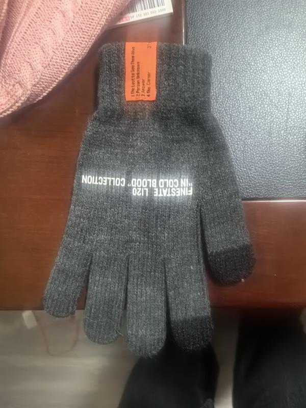 Gants tricotés gris chiné foncé avec impression texte blanc et doigts compatibles écran tactile posés à plat