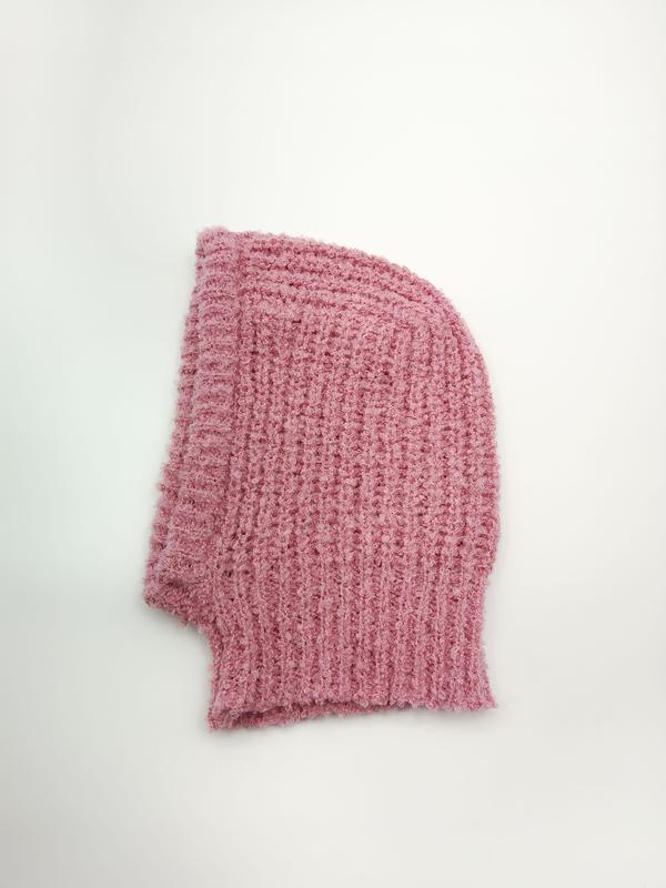 Cagoule en grosse maille rose texturée façon nid d'abeille